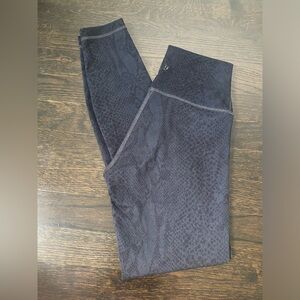 Black Lululemon snake pattern leggings
